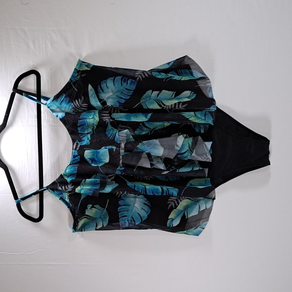 3XL one piece with mesh overlay. NWOT. Adjustable straps and removable bra pads.